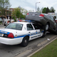 Illustration for article titled Watch A Police Car Make Love To A Camry, Now With Video!